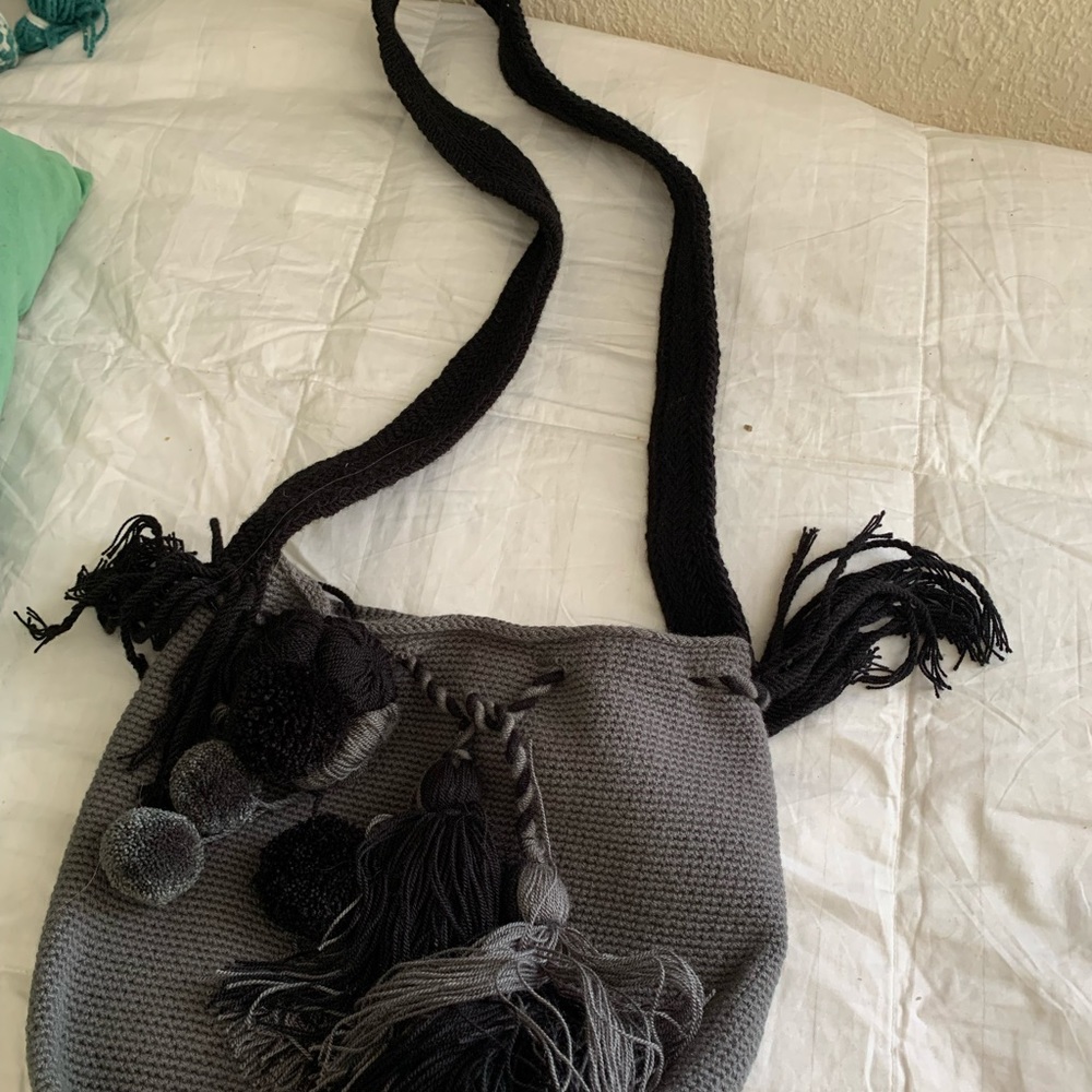 This is the smallest version of a Colombian wayuu bag in black and gray.